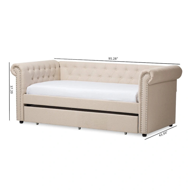 Cama nido tapizada con ribete de tachuelas