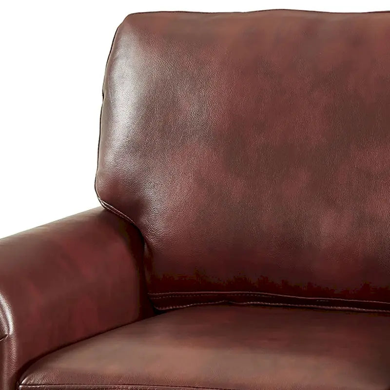 Sillón decorativo tapizado en poliuretano con reposabrazos enrollados